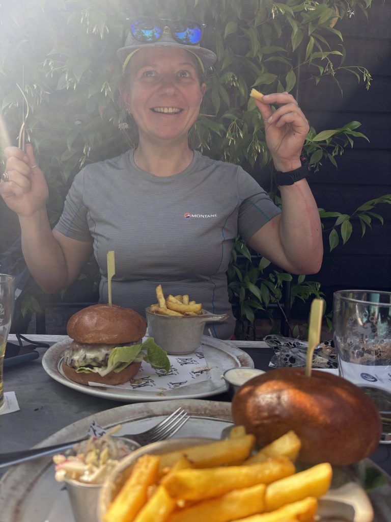 A large, hearty pub burger and chips served at The Kings Arms in Elham.