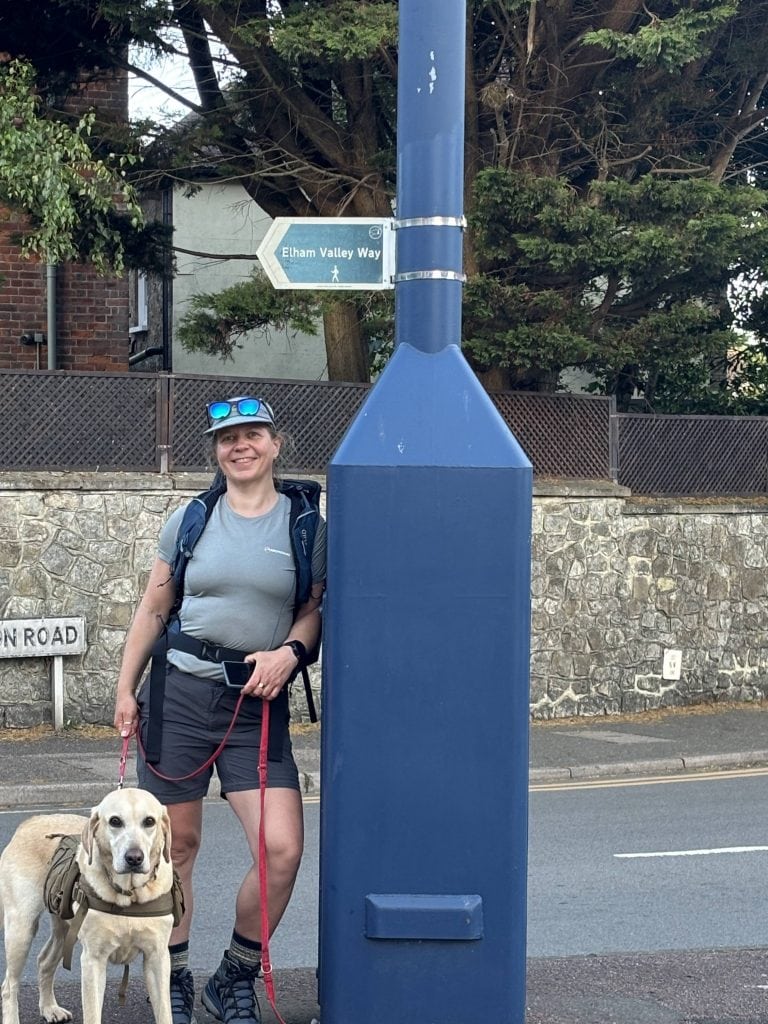 A paved footpath leading out of the town and straight toward the Hythe pebble beach.