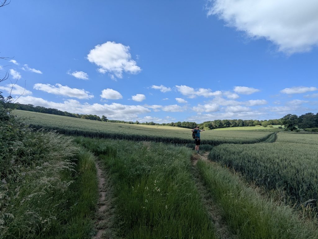 A view of the trail merging back onto a quiet country road near the village of Bridge.